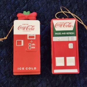 Two vintage-style Coca-Cola vending machine Christmas ornaments. 